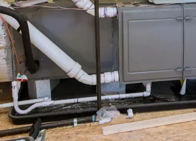 AC drain tray cleaning to prevent leaks and water damage